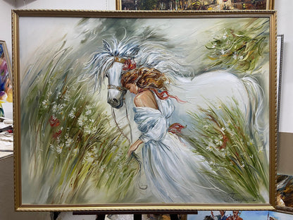 Stretched and framed painting of lady and horse in flower field ready to hang