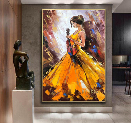 May include: A painting of a woman in a yellow dress playing a violin. The background is a colorful abstract design with a gold frame. The painting is titled 'Bivkart'.